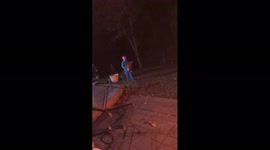 Boy Carries Tree Stump