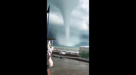 Waterspout comes ashore and rips through pier and beachfront cafe in Sochi, Russia