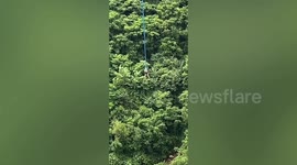 Bungee jumper left suspended in mid-air due to power cut in China