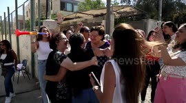 Palestinian high school students celebrate after results the final exams known as 