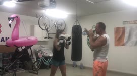 Uncle teaching Niece how to be a boxer