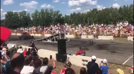 Vehicle with man and child inside catches fire at Russian stunt show