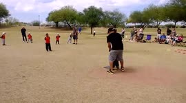 Boy Waves During Baseball Run