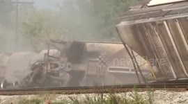 Train wagons derail and flip over (full video)