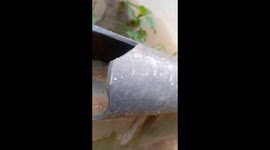 The camera man video a broken pipe and water droplets to show beauty