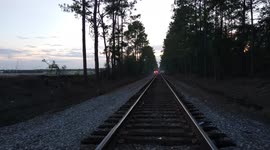 Brush fire report on railroad tracks in Jacksonville FL police and fire trucks on was onsite