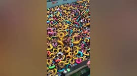 Thousands of tourists crammed into swimming pool at water park in China