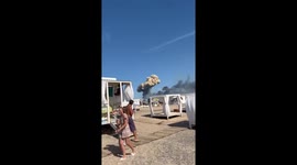 Beachgoers panicked as blasts hit Russian air base in Crimea