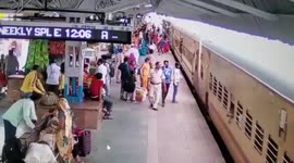 Vigilant police officer rescues woman who slipped while trying to board moving train in northern India
