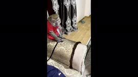 The guy is running away from a pet monkey named Jimmy!