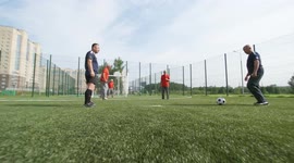 Look at old men playing football,sport