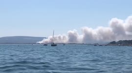 Smoke streaks across sky as wildfires break out in Dorset