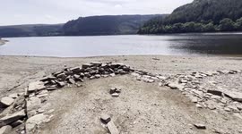 UK heatwave reveals underwater village at Lake Vyrnwy, Wales