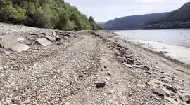 Newsflare Edit - Lake Vyrnwy ever receding waters. Video 2 Now showing old roads and bridges. video 1 also on my profile soon.