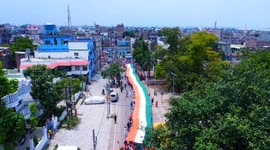 Thousands carry 75 feet long tricolour flag to celebrate Independence Day in Northern India