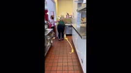 Hilarious scene as restaurant worker drops tub of sauce twice in quick succession