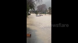 Cars submerged as floods strike New Zealand's South Island
