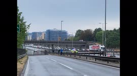 Flooding on A406, trapped car