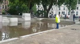 Aftermath of flash flooding in London's Victoria and Parliament Square