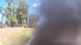 Large truck coal rolls cyclist. Truck close passes cyclists. Dangerous driving caught on camera