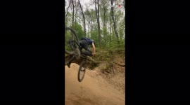 Cyclist makes AWESOME recovery after messing up mid-air bike stunt