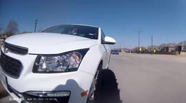 Car almost hits cyclist. Incredibly close call. Dangerous driving caught on camera