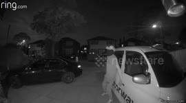 Suspected thief caught on Ring home-cam trying to get into a parked taxi cab