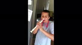 Boy Plays Recorder With Nose