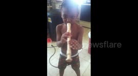 Boy Plays Recorder