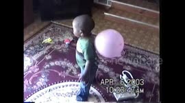 Balloon on Boy's Back