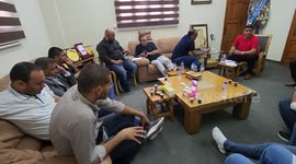 Official of the civil affairs in the Gaza Strip, Iyad Nasr spesks during a meeting about the New permits