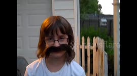 Girl Wears Fake Mustache