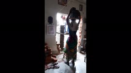 Indian worker and women worker make brick wall in sambalpur .Construction workers form a crane to transport bricks to higher elevations in the absence of machineries in Odisha.
