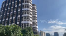 Engineers fit 40-storey towers with 3,500 kg of explosives ready for demolition