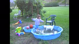 Girl and Dog in Pool