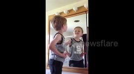 Boy Talks to Reflection