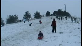 Girl Sleds Into Wall