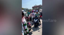 Motorcyclists deliver supplies to firefighters battling mountain blaze in China