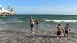 Piers Corbyn enjoys the hot weather in Bournmouth and takes a swim in the sea.