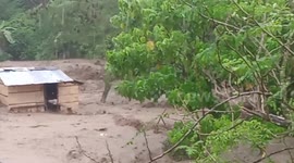 Tropical storm Ma-On washes away house in the Philippines