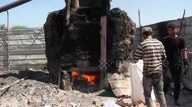 Palestinian workers reuse plastics to produce fuel in the nourthern of Gaza strip