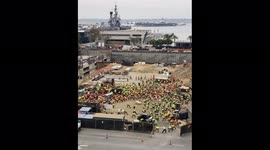 Oddly satisfying sight of hundreds of San Diego construction workers stretching at the same time