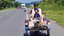 Sweet old married couple ride modified motorcycle together to work every day