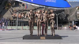 Viral 'Four lads in jeans' meme immortalised with a STATUE in same spot where photo was taken.