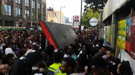 Bus shelter collapses after too many Notting Hill Carnival revellers dance on top of it