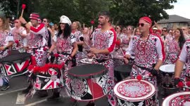 Second day of Notting Hill Carnival begins with samba outfits and fireworks