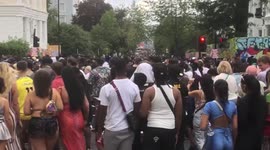 Streets packed as partiers dance in the street at Notting Hill Carnival