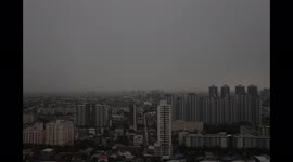 Time-lapse footage shows thunderstorm engulfing buildings in Bangkok, Thailand