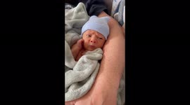 Newborn's hilarious grumpy expression