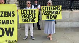 Extinction Rebellion protesters glue themselves inside and outside Parliament